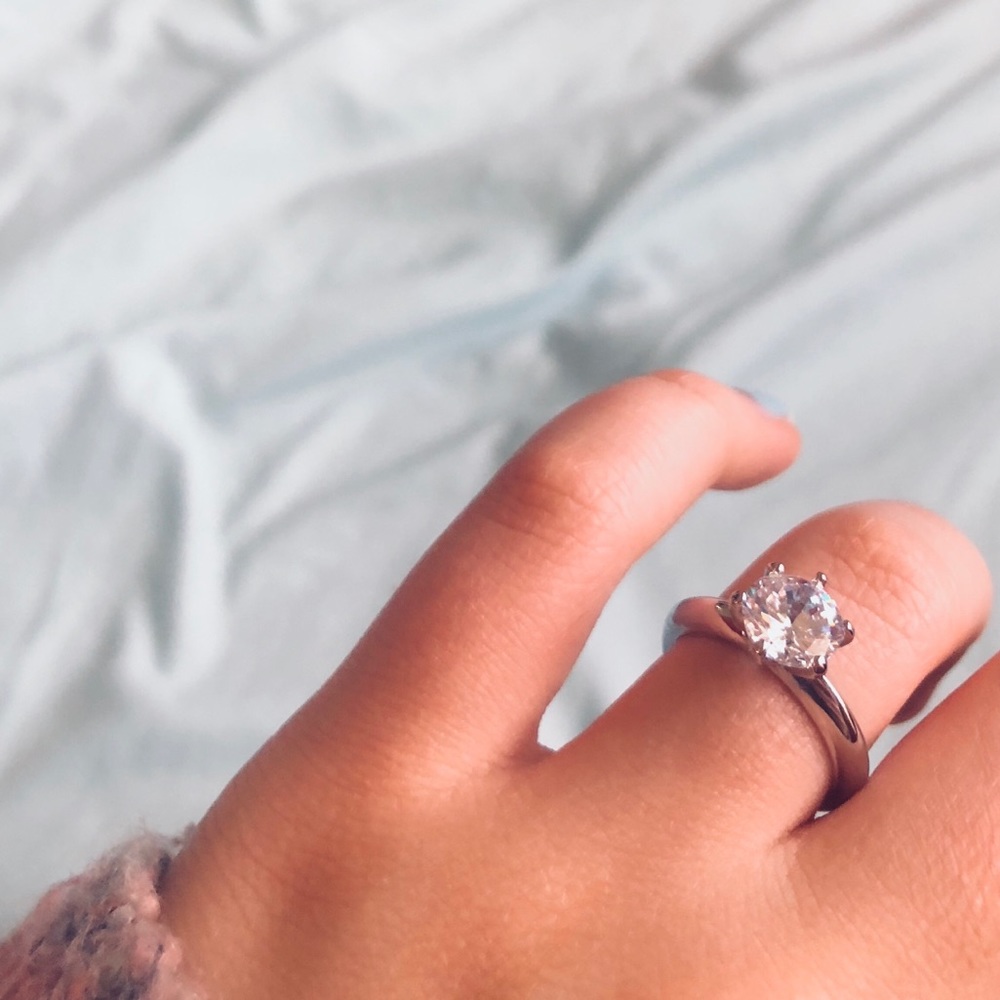Simple silver diamond engagement ring